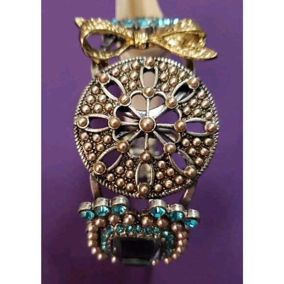 Chunky Ornate Clamper Bangle Bracelet Silver Tone Blue Rhinestones Gold Tone Bow - Picture 2 of 8